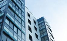 Modern commercial building exterior with glass windows